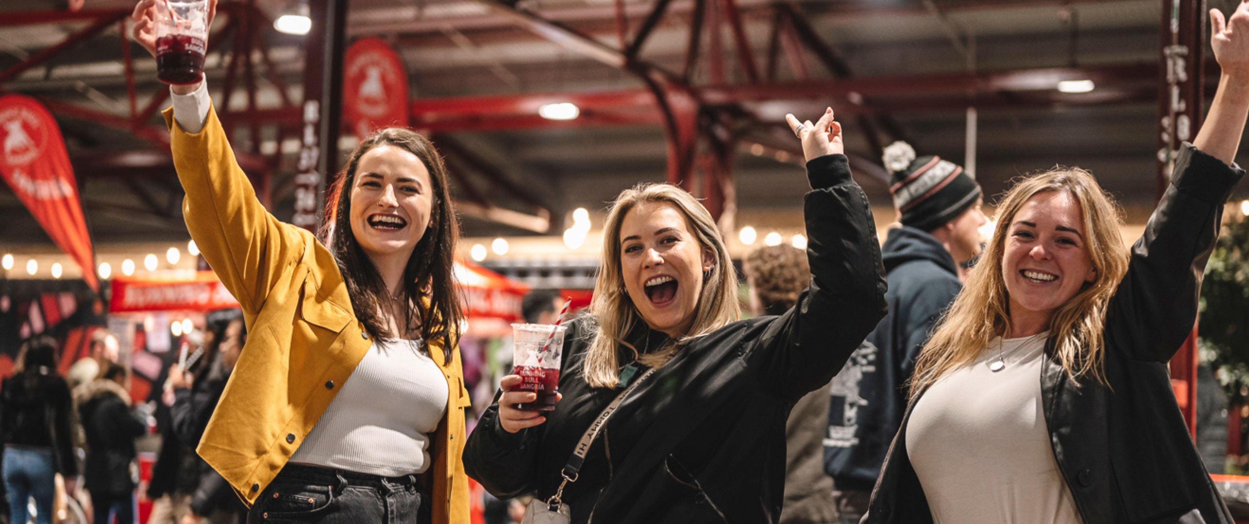 girls having a fun time at the night market