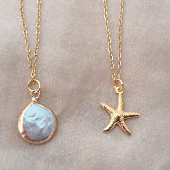 Two yellow plated necklaces